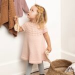Breipakket Jurkje Snowbell Dress Sandnes Garn met gratis patroon 6-12 mnd