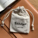 petiteknit wolkam hout met zakje